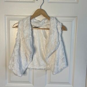 Super soft white faux fur vest.